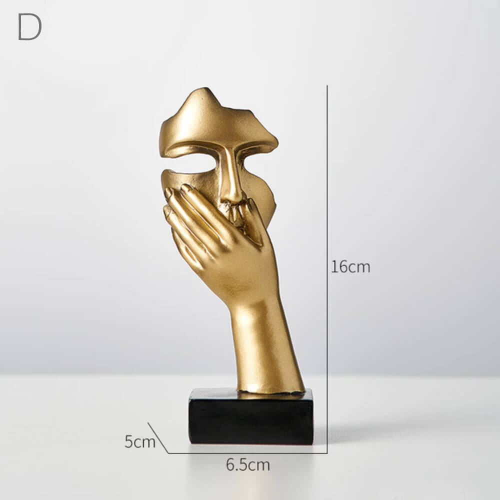 Sculptures de visage d'or