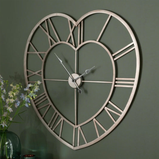 Horloge murale dorée ou bronze