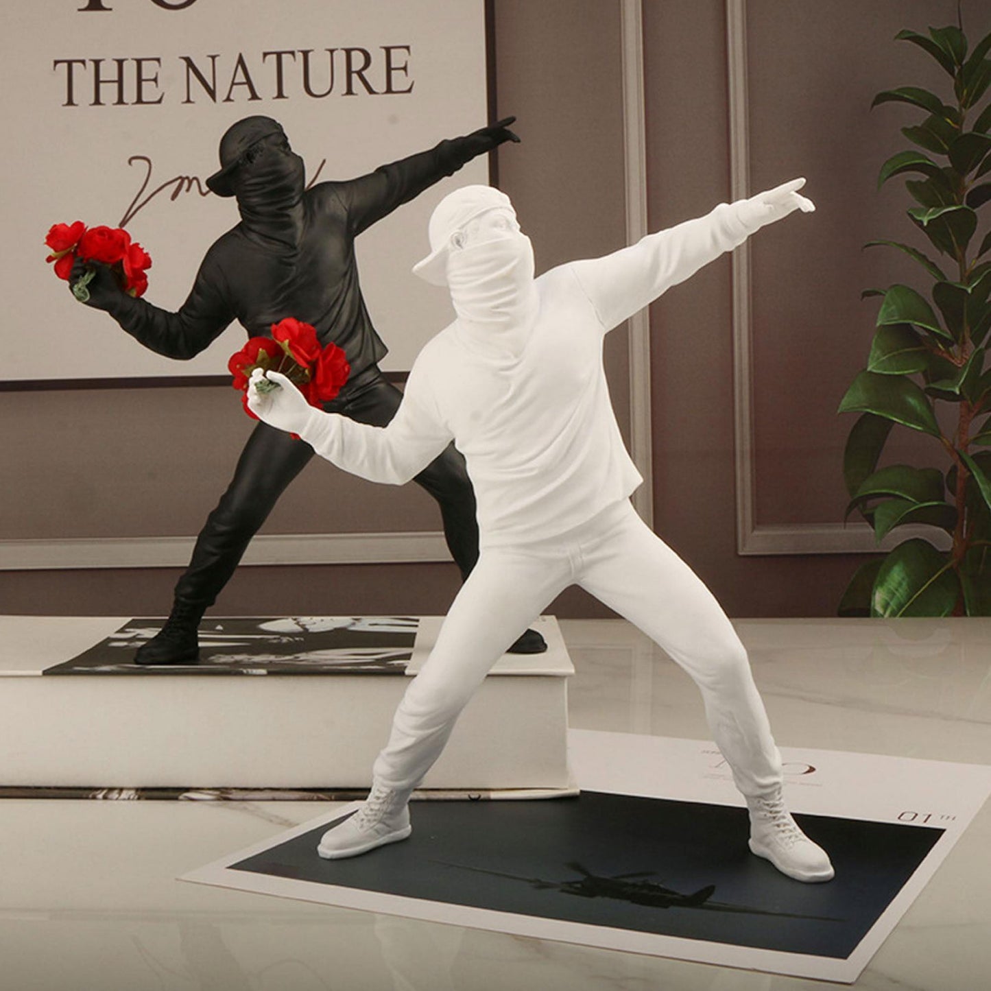 Artist Banksy flower thrower sculpture figurine in black, white or gold