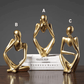 Scultura d'oro del pensatore