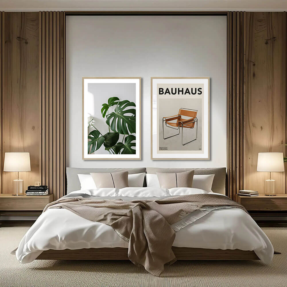 Modern bedroom with a bed, lamps, and wall art in a neutral color scheme.