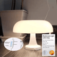 Mushroom-shaped light with strip on a wooden surface, with product details overlay.