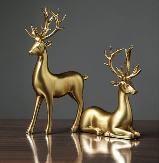 Gull hjort- og hjortskulpturer