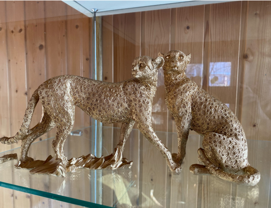 Kultaiset leopardikoristeet