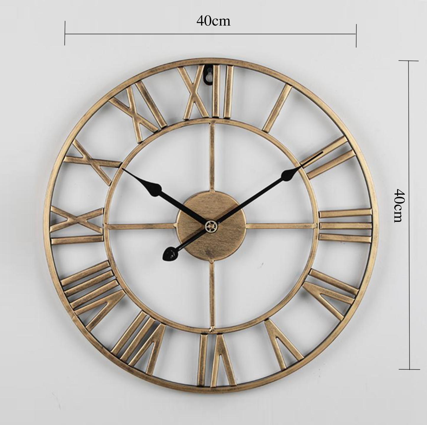 Horloge murale squelette en or ou en bronze