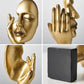 Sculptures de visage d'or