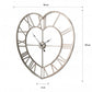 Reloj de pared con esqueleto de corazón plateado